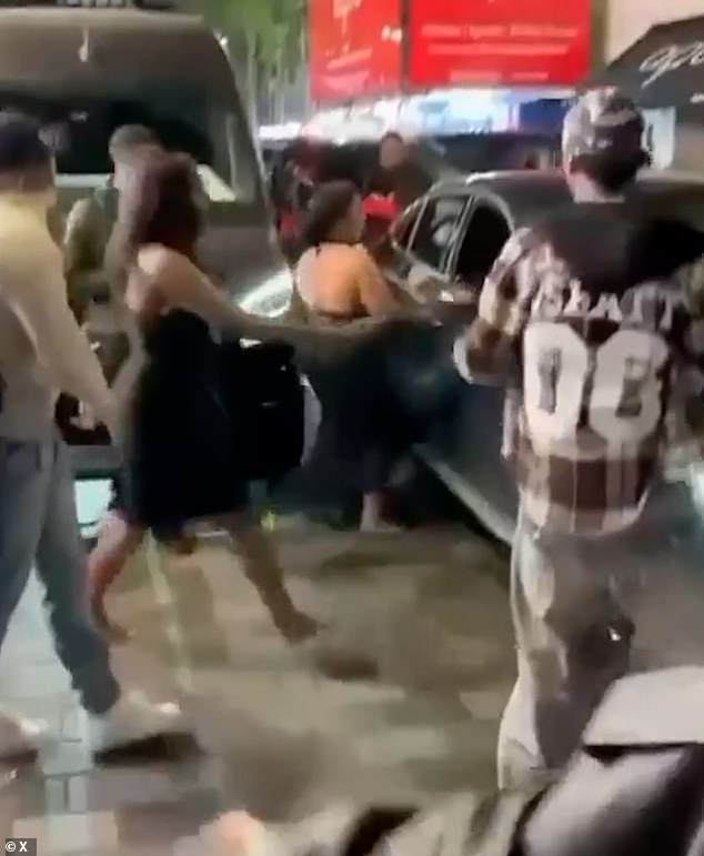 Car plows into pedestrians on Oxford Street, leaving one pinned under wreckage