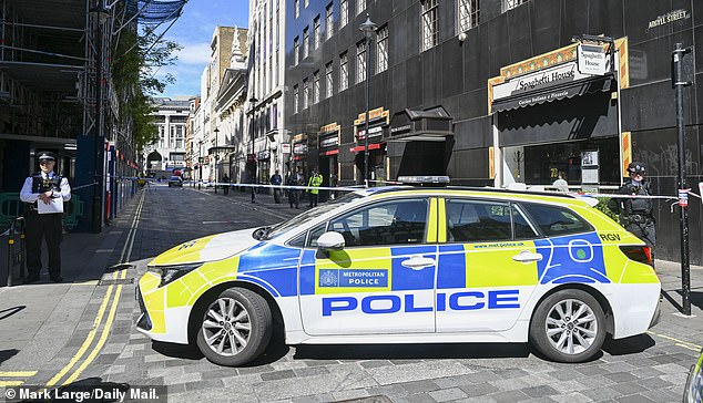 Car plows into pedestrians on Oxford Street, leaving one pinned under wreckage