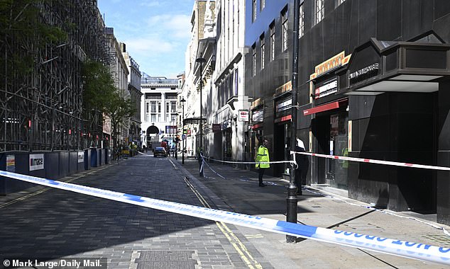 Car plows into pedestrians on Oxford Street, leaving one pinned under wreckage