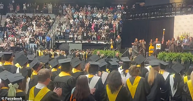 Hunter Metcalf receives valedictorian diploma while honoring deceased twin Austin