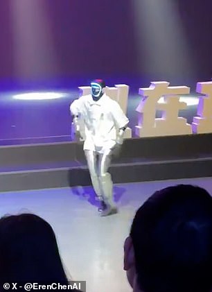 Humanoid robot stumbles over stage step during public dance performance.